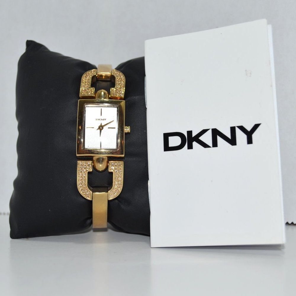 DKNY Gold Bangle Crystals Brushed Silver Dial Womens watch NY8130